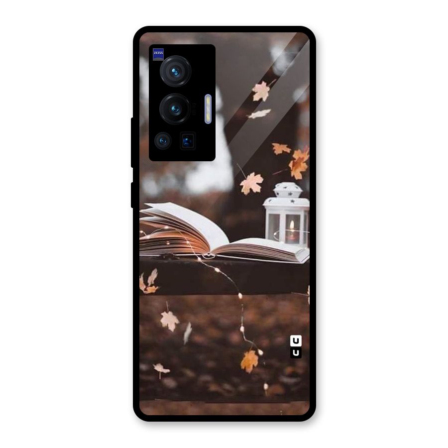 Book and Fall Leaves Glass Back Case for Vivo X70 Pro