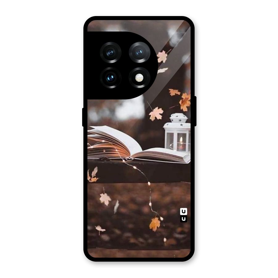 Book and Fall Leaves Glass Back Case for OnePlus 11